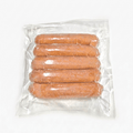 Five Bison Hotdogs (Frozen) in a clear plastic vacuum-sealed bag
