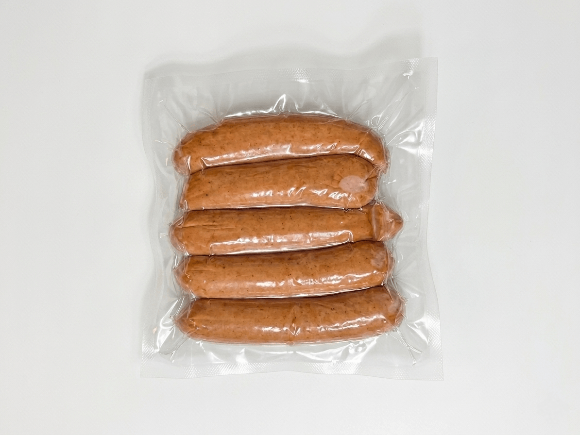 Five Bockwurst in a clear plastic vacuum-sealed bag