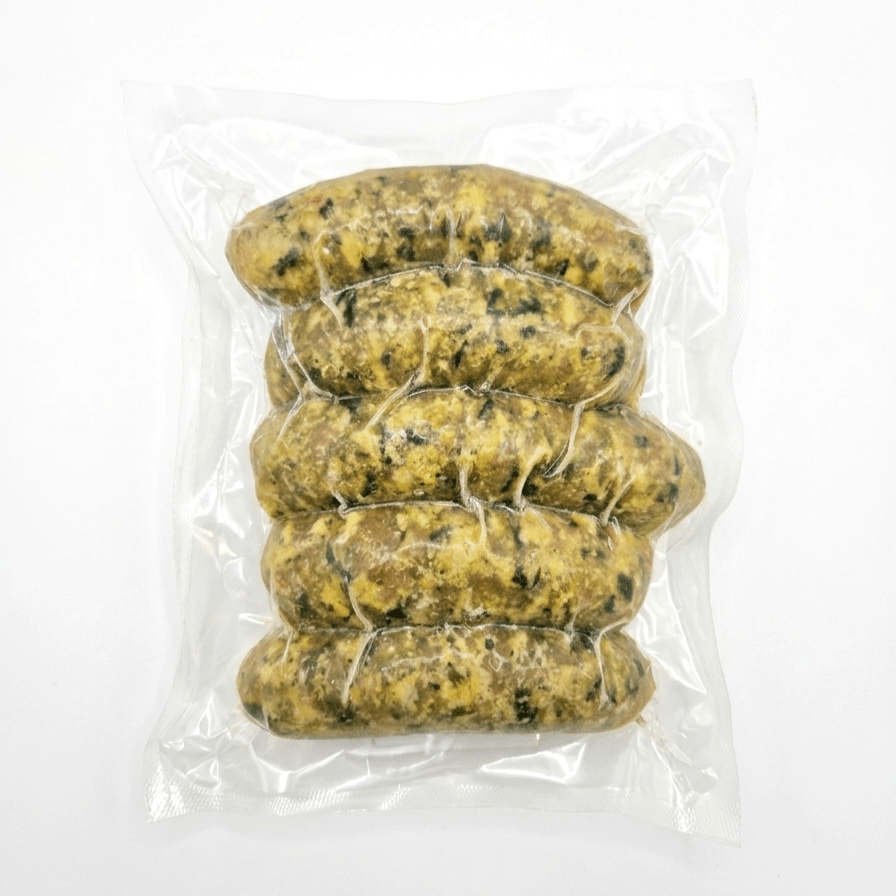 Five of Chicken Spinach Feta Sausage inside a clear plastic vacuum-sealed bag