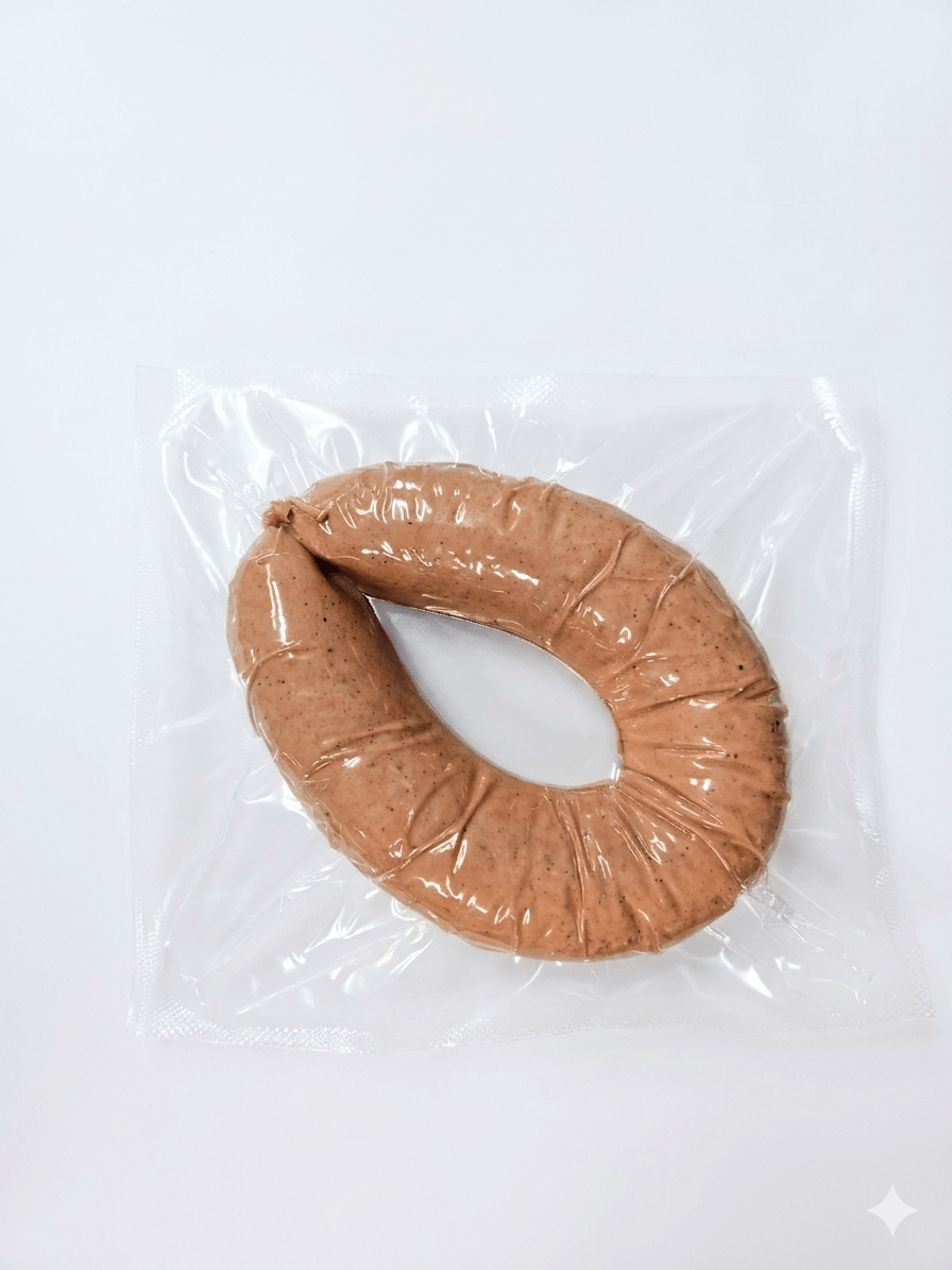 A Fleish Ring wrapped in clear plastic packaging