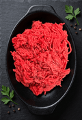 Lean Ground Beef piled in a black oval serving dish