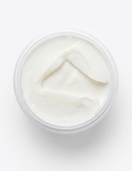 A top-down view of a clear plastic tub filled with Pork Lard