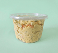 A clear plastic tub with a clear lid containing Potato Salad