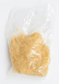 A clear plastic bag containing Saerkraut