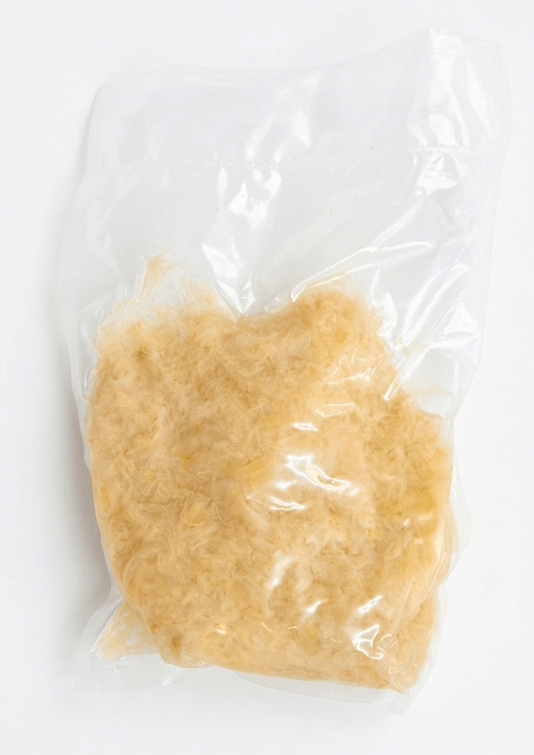 A clear plastic bag containing Saerkraut